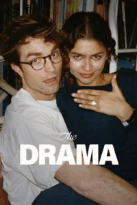Affisch av filmen The Drama, en kvinna i mörkblå cardigan håller up sin vänsterhand och visar sin förlovningsring sitter på en man i en vit t-shirt i en fåtölj